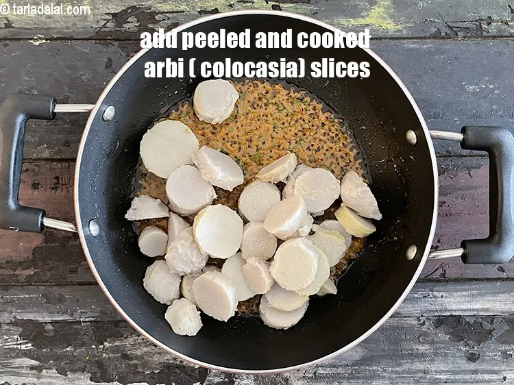 Step 30 – Add&nbsp;<meta charset="UTF-8" />1 1/2 cups&nbsp;peeled and cooked colocassia (arbi) slices