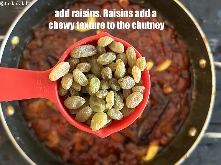 Step 21 – Add 1/4 cup raisins.&nbsp;Raisins add a chewy texture to the chutney that contrasts nicely with …