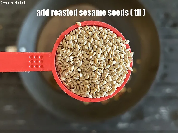 Step 19 – Add&nbsp;<meta charset="UTF-8" />1 tbsp&nbsp;lightly roasted&nbsp;<a href="glossary-sesame-seeds-til-gingelly-seeds-612i">sesame seeds (til)</a>.