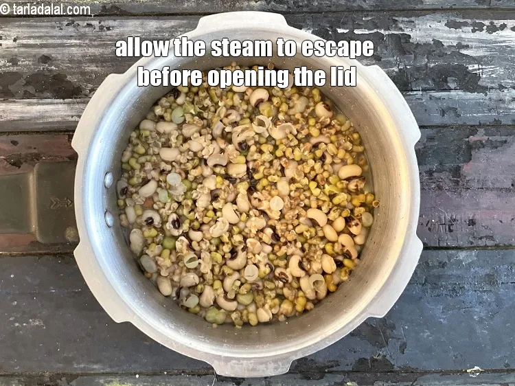 Step 19 – Allow the steam to escape before opening the lid.