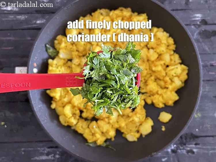 Step 62 – Add&nbsp;<meta charset="UTF-8" />2 tbsp&nbsp;finely&nbsp;<a href="glossary-chopped-coriander-783i">chopped coriander (dhania)</a>.