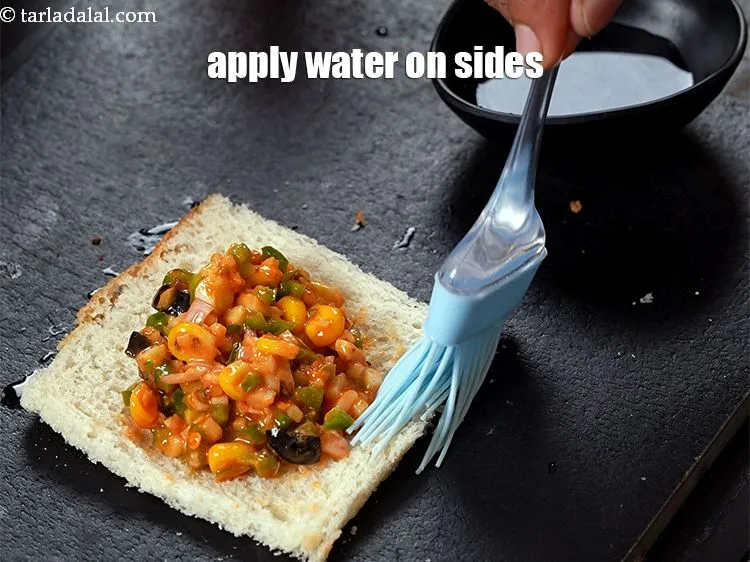 Step 19 – Apply little water on the sides of the bread using a brush.