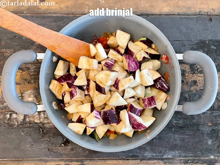 Step 20 – Add 2 cups chopped brinjal after soaking and draining in water.