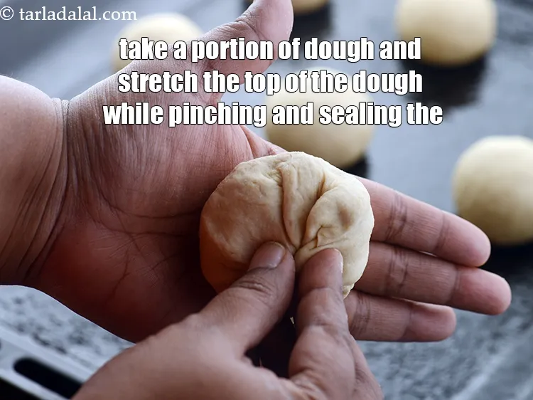 Step 17 – Take a portion of dough and stretch the top of the dough while pinching and …
