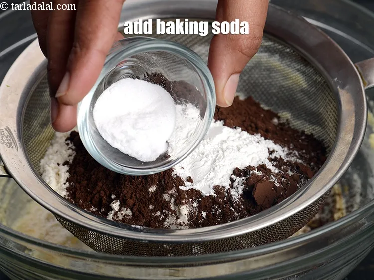Step 19 – Add &frac12; tsp <a href="https://www.tarladalal.com/glossary-baking-soda-soda-bi-carb-615i">baking soda</a>.