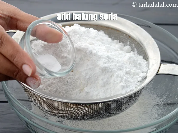 Step 19 – Add 1/4 tsp&nbsp;<a href="https://www.tarladalal.com/glossary-baking-soda-soda-bi-carb-615i">baking soda</a>.&nbsp;