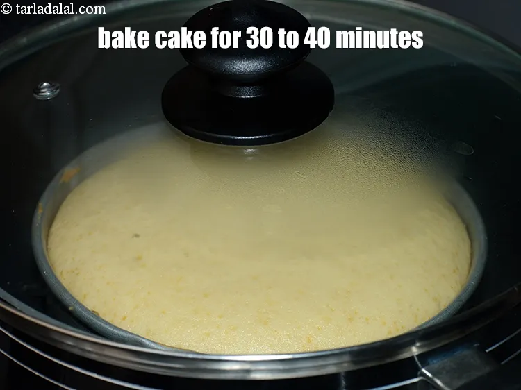Step 21 – Bake the cake in a preheated pan for 30-40 minutes, 5 minutes on medium flame …