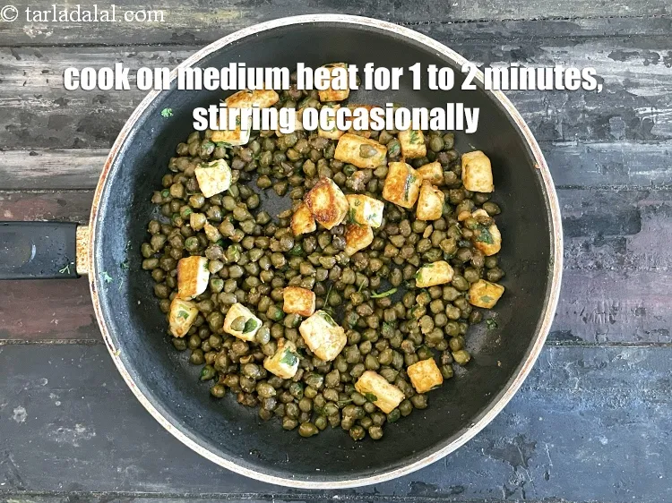 Step 29 – Cook on a medium flame for 1 to 2 minutes, while tossing occasionally.