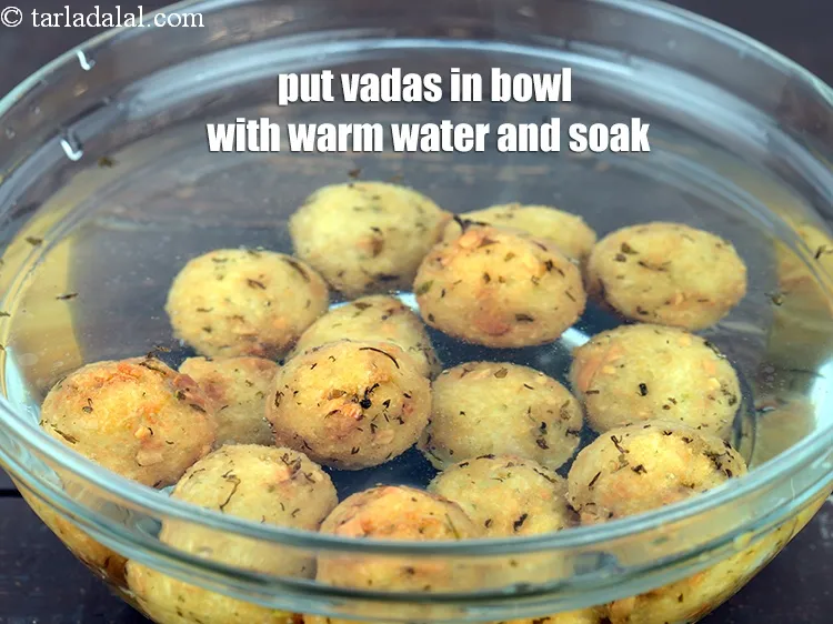 Step 19 – Put the vadas in a bowl with enough warm water and allow them to soak …
