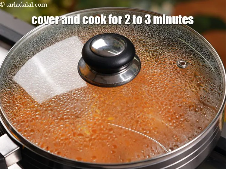 Step 19 – Cover with a lid and cook on a medium flame for 2 to 3 minutes, …