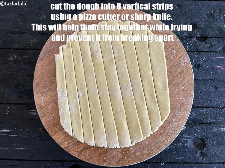 Step 19 – Cut the rolled dough into 8&nbsp;vertical strips using a pizza cutter or sharp knife. This …