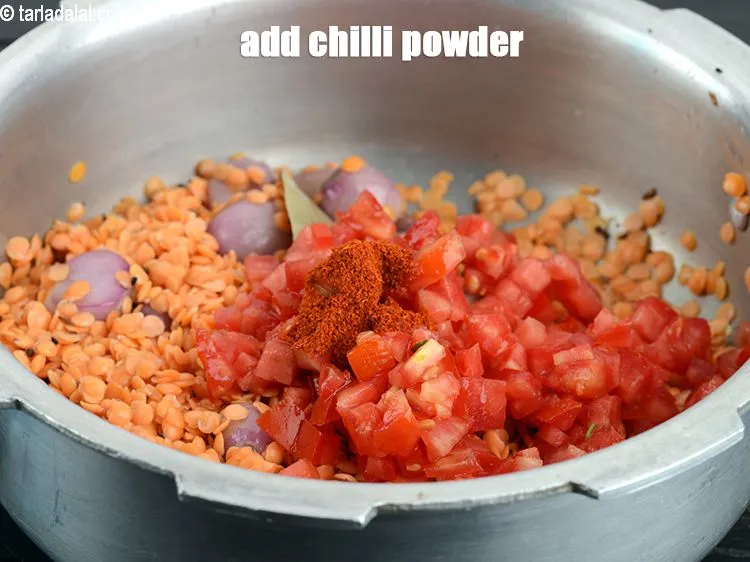 Step 19 – Add &frac12; tsp <a href="https://www.tarladalal.com/glossary-chilli-powder-red-chilli-powder-339i">chilli powder</a>.