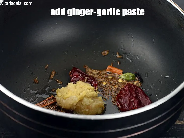 Step 19 – Add 2 tsp <a href="https://www.tarladalal.com/glossary-ginger-garlic-paste-adrak-lehsun-ki-pate-adrak-lahsun-ki-paste-939i">ginger-garlic (adrak-lehsun) paste</a>.