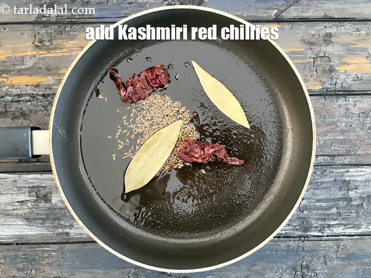 Step 19 – Add&nbsp;<meta charset="UTF-8" /><strong>2&nbsp;whole dry Kashmiri&nbsp;red chillies.</strong>