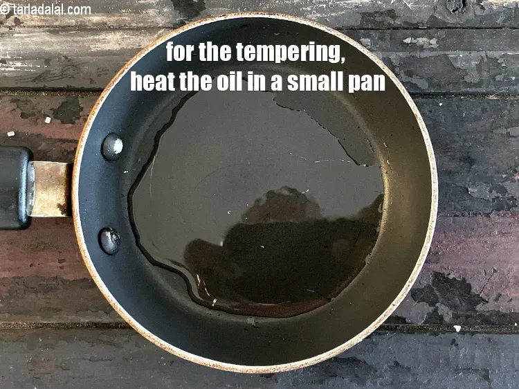 Step 19 – For the tempering, heat&nbsp;<meta charset="UTF-8" />1 tsp&nbsp;<a href="glossary-oil-671i">oil</a>&nbsp;in a small pan.