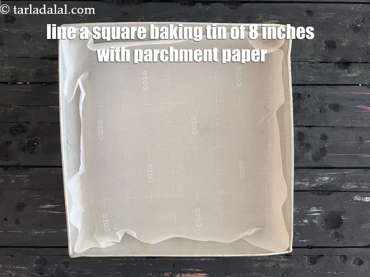 Step 27 – Line a square baking tray &nbsp;of 8 inches with parchment paper.