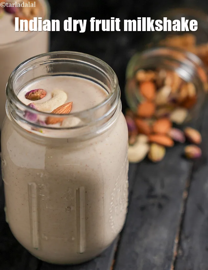 Step 23 – <html><head><meta charset="UTF-8"></head><body><p>Serve&nbsp;<strong>dry fruits nuts milkshake</strong>&nbsp;immediately. This milkshake can be prepared during fast (<a href="https://www.tarladalal.com/recipes-for-Navratri-Fasting-Navratri-Vrat-1006">see vrat …