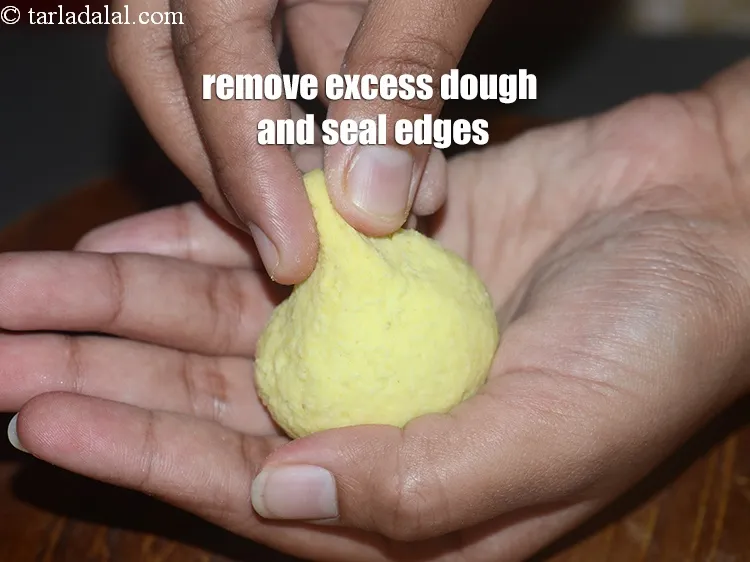 Step 22 – Remove the excess dough and seal the edges.