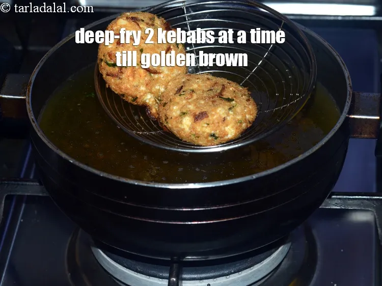 Step 19 – Deep-fry 2 kebabs at a time till they turn golden brown in colour from both …