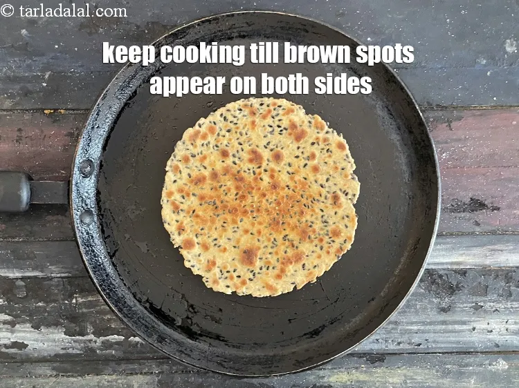 Step 18 – Keep cooking&nbsp;till brown spots appear on both the sides. Your soya khakhra is ready.