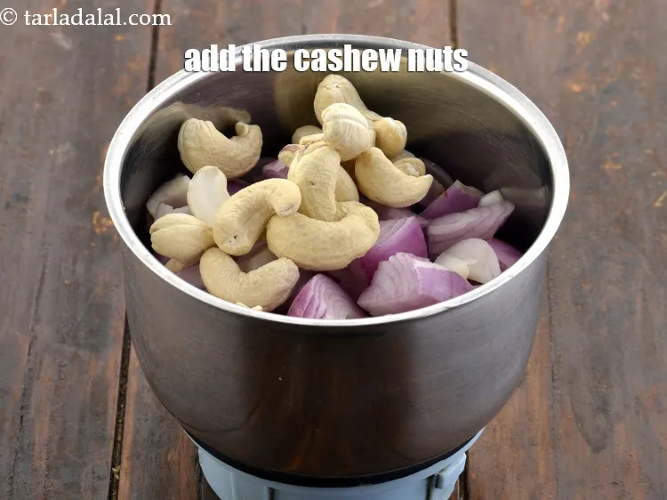 Step 17 – Add the cashew nuts. This is used to give thickness to the gravy.