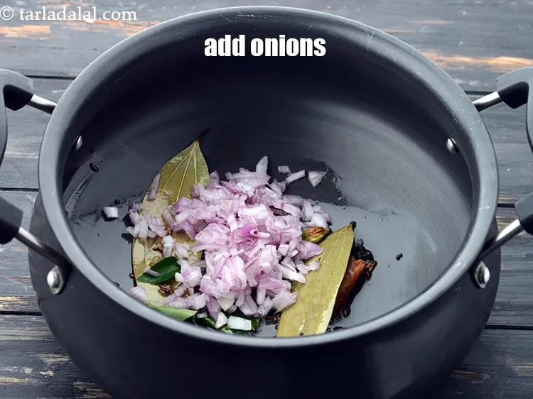 Step 20 – Add 1/4 cup&nbsp;finely&nbsp;<a href="https://www.tarladalal.com/glossary-chopped-onions-722i">chopped onions</a>.&nbsp;&nbsp;
