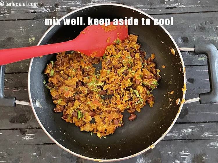 Step 39 – Mix well. Keep aside to cool slightly.&nbsp;