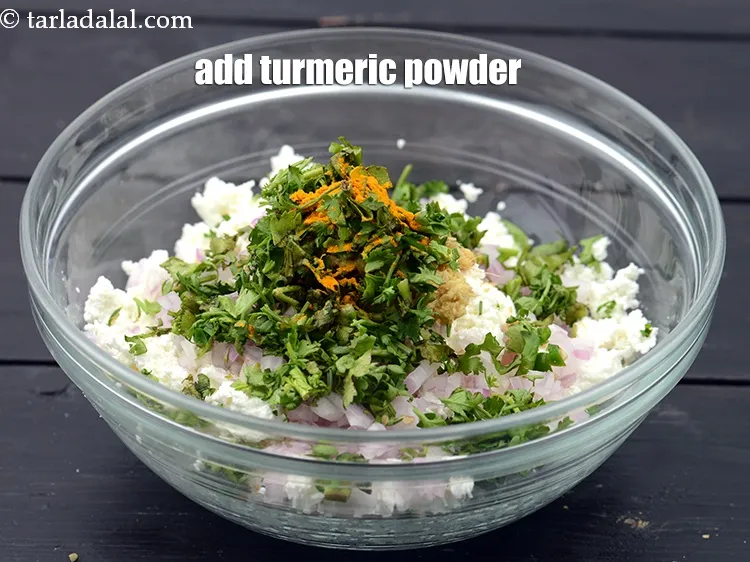 Step 21 – Add &frac14; tsp <a href="https://www.tarladalal.com/glossary-turmeric-powder-haldi-645i">turmeric powder (haldi)</a>.