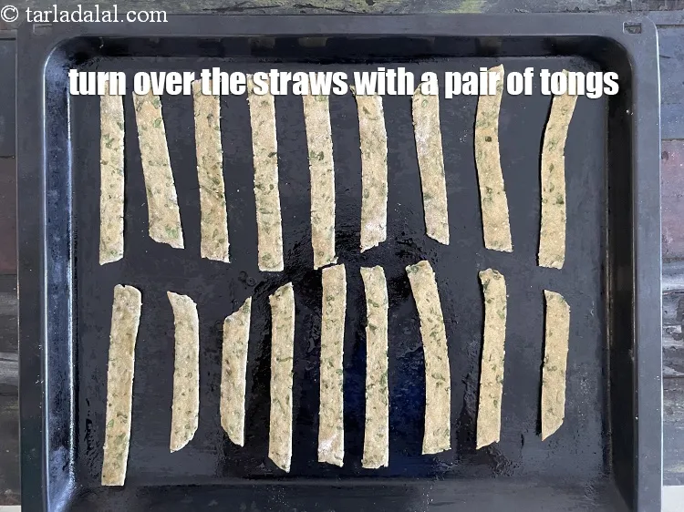 Step 22 – Turn the straws over with a pair of tongs.&nbsp;