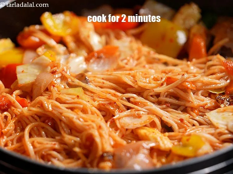 Step 27 – Toss well and cook on high flame for 2 minutes, while tossing occasionally.