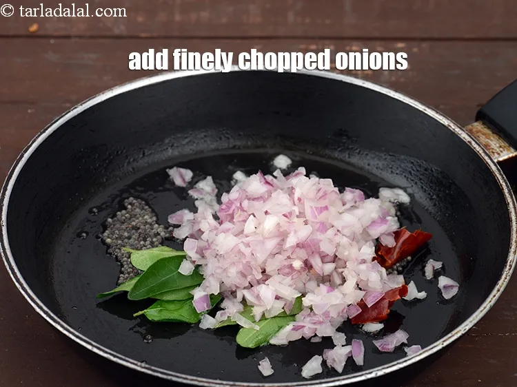 Step 19 – Add 2 tbsp&nbsp;finely&nbsp;<a href="https://www.tarladalal.com/glossary-chopped-onions-722i">chopped onions</a>.