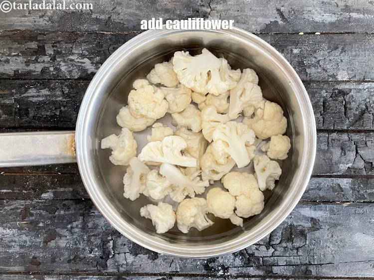 Step 3 – Add 2 cups&nbsp;<a href="https://www.tarladalal.com/glossary-cauliflower-florets-753i">cauliflower florets</a>.