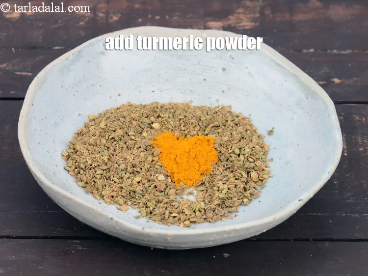 Step 20 – Add 1 tsp&nbsp;<a href="https://www.tarladalal.com/glossary-turmeric-powder-haldi-645i">turmeric powder (haldi)</a>.