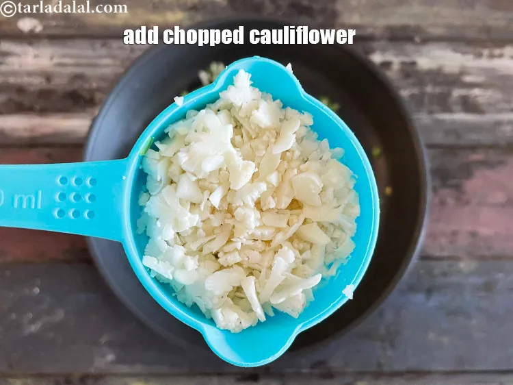 Step 18 – Add&nbsp;<meta charset="UTF-8" />1/4 cup&nbsp;finely&nbsp;<a href="glossary-chopped-cauliflower-796i">chopped cauliflower</a>.