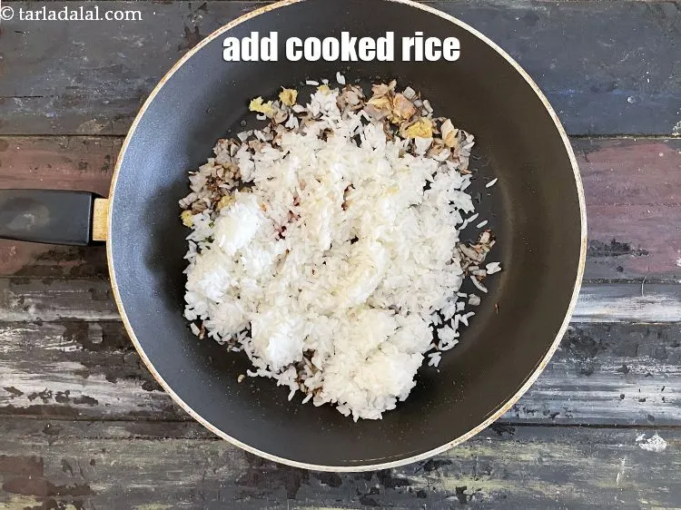 Step 22 – Add&nbsp;<meta charset="UTF-8" />1 cup&nbsp;<a href="glossary-soaked-and-cooked-rice-1906i">cooked rice (chawal)</a>.