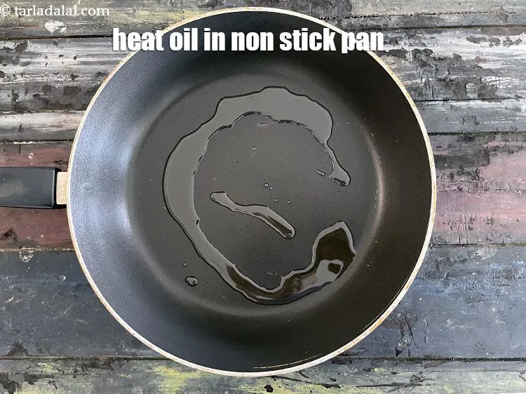 Step 30 – Heat 1 tbls oil in a broad non-stick pan.