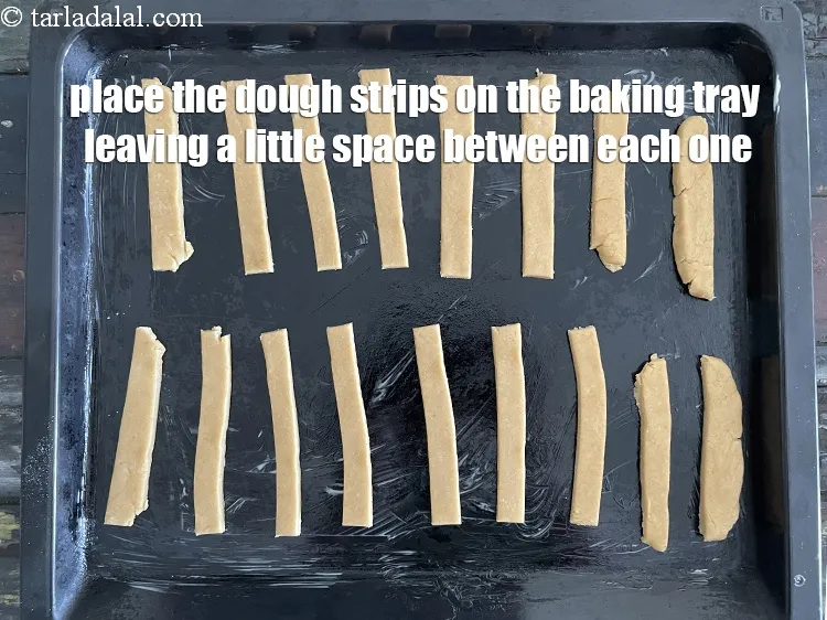 Step 21 – Place the strips on the baking tray. <u><em>You will get a total of 17 cheese …