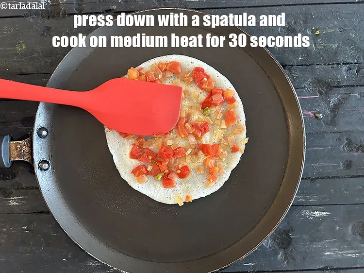 Step 27 – Press down with a spatula and cook for 30 seconds on medium heat.