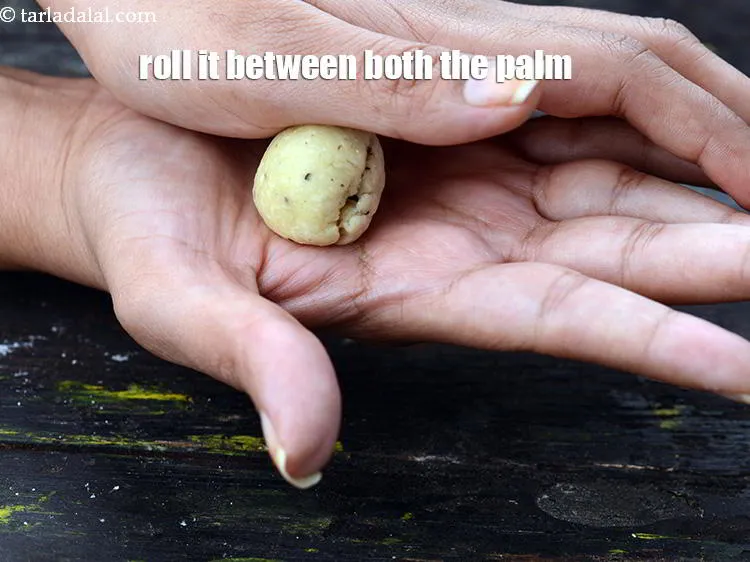 Step 21 – Roll it between both the palms to form an uniform smooth ball.