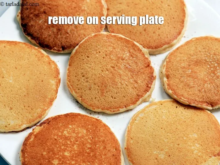 Step 19 – Remove on a serving plate.&nbsp;Similarly, repeat steps to make remaining pancakes.