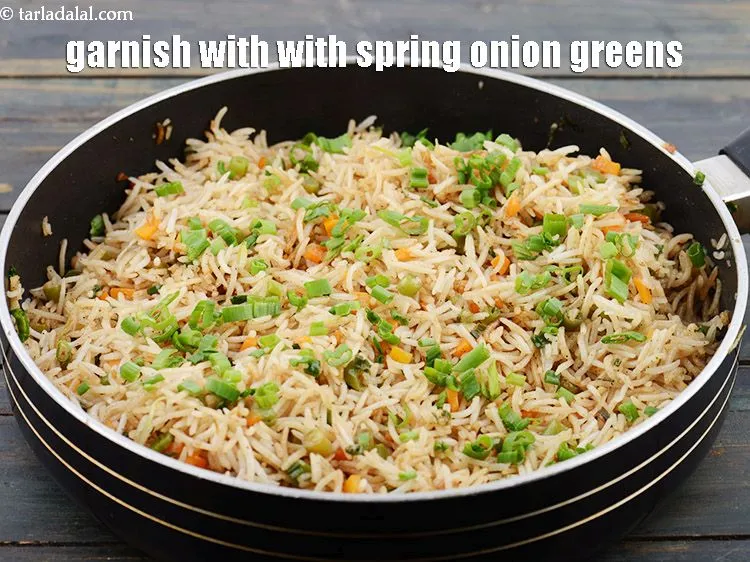 Step 29 – Garnish with 2 tbsp&nbsp;finely&nbsp;<a href="https://www.tarladalal.com/glossary-chopped-spring-onion-greens-1030i">chopped spring onion greens</a>.&nbsp;