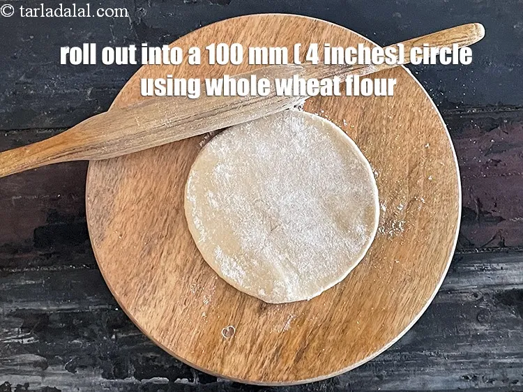 Step 26 – Roll out a portion of the dough into a 100 mm. (4 inches) diameter circle …