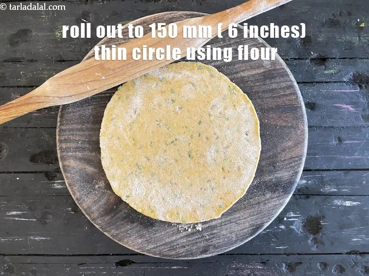 Step 19 – Roll out one portion of the dough into 150 mm. (6&quot;) diameter thin circle using …