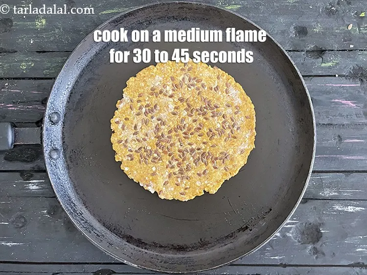 Step 22 – Cook the roti on a medium flame for 30 to 45 seconds.