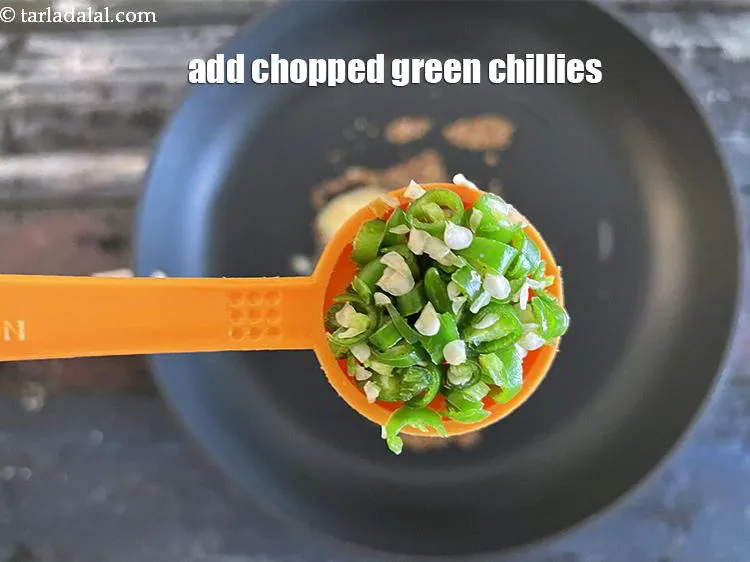 Step 19 – Add&nbsp;1 tsp&nbsp;finely&nbsp;<a href="glossary-chopped-green-chilli-820i">chopped green chillies</a>.