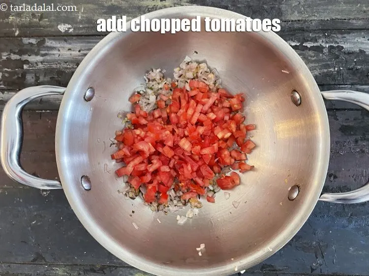 Step 28 – Add&nbsp;1 cup&nbsp;<a href="glossary-chopped-tomatoes-779i">chopped tomatoes</a>.