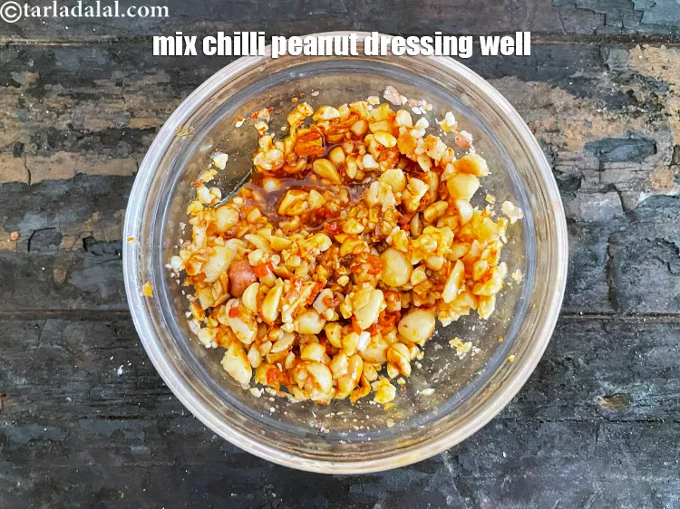 Step 13 – &nbsp; Mix chilli peanut dressing&nbsp;well and keep aside.