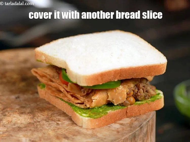 Step 21 – Cover it with another slice of bread, with the buttered &ndash;chutney side facing downwards.