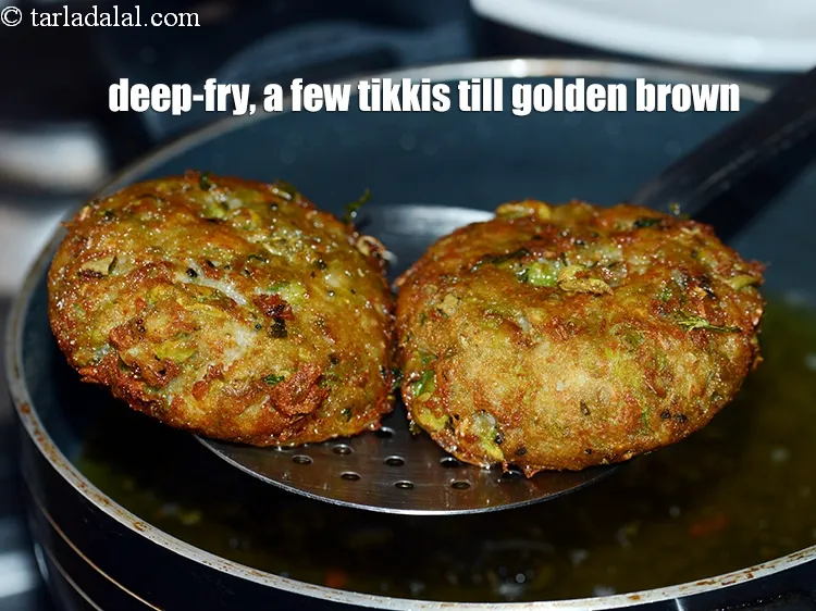 Step 20 – Deep-fry, a few tikkis at a time on a medium flame, till they turn golden …