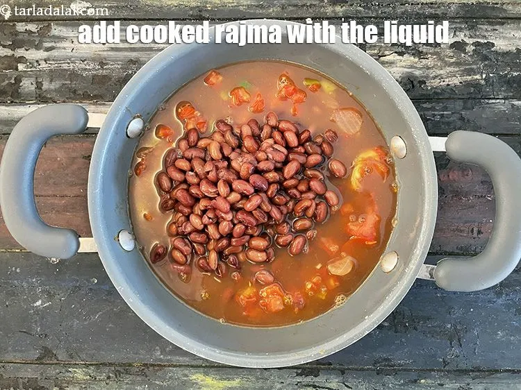 Step 27 – <p>Add the rajma (along with the liquid they were cooked in).</p>